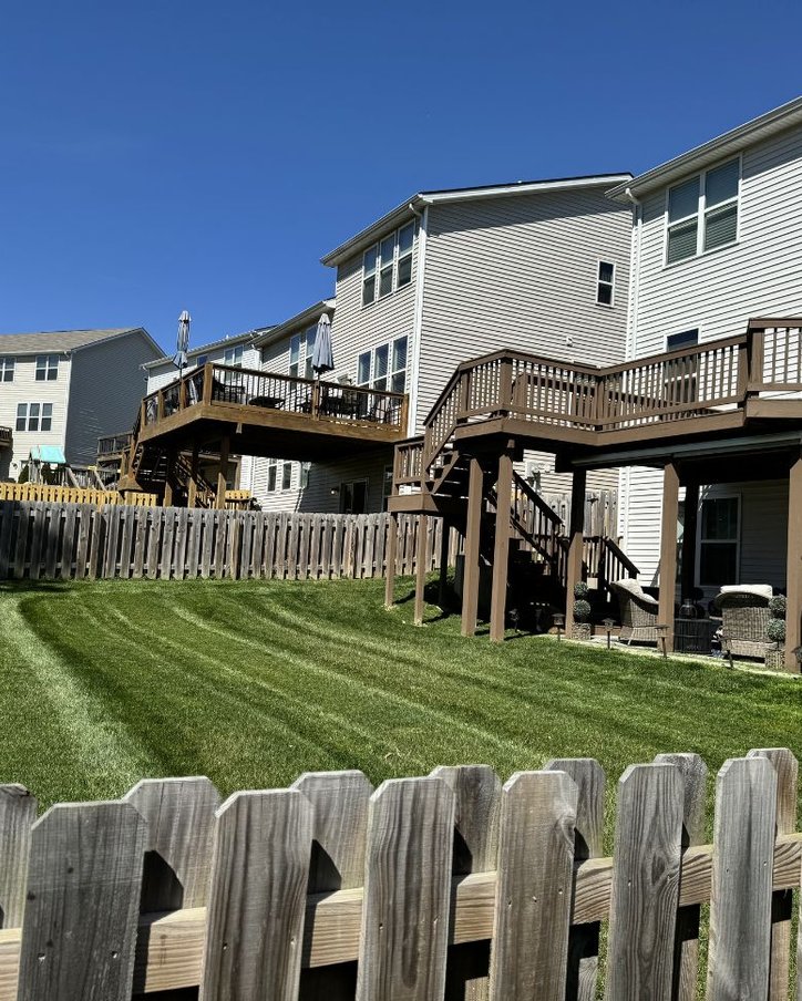 Bryant's Best Outdoor Services mowing lawns in Louisville KY