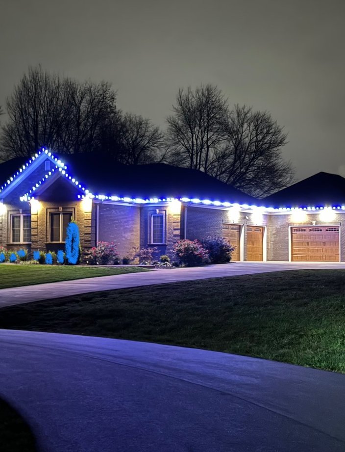 holiday light installation blue white