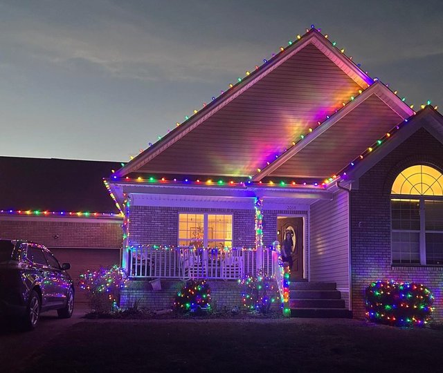 multicolor Christmas lights on a home in Valley Station KY