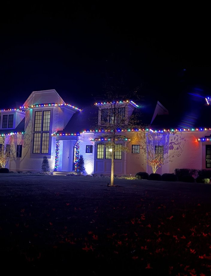 multicolor holiday light installation farmhouse