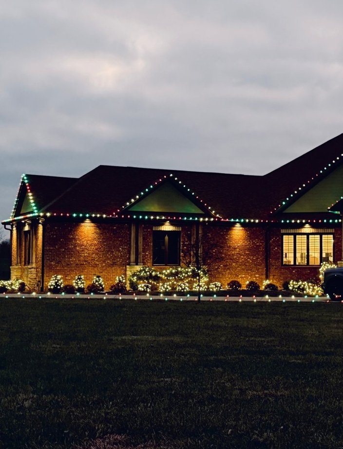 red green christmas light installation ranch home