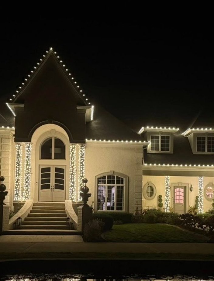 warm white christmas lights luxury estate lighted trees